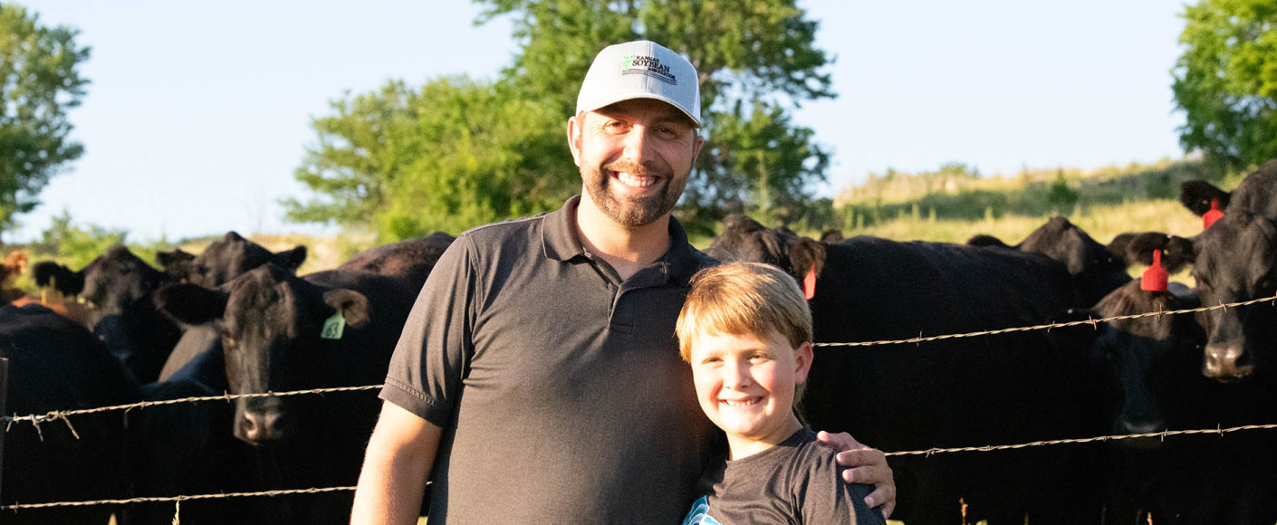 Daniel Anderes and his son with cattle