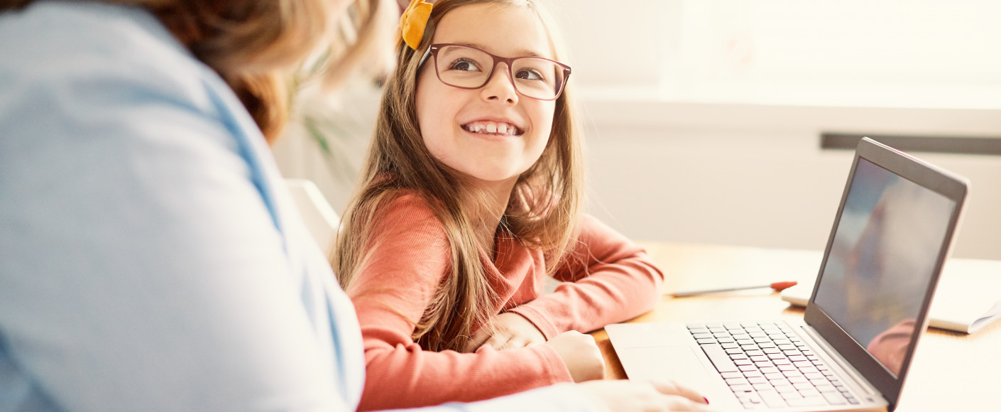 Child at computer for virtual farm tours