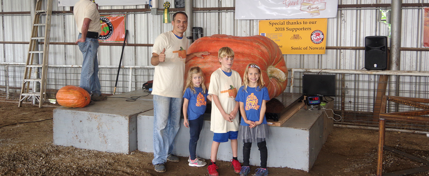 The Marintzer Family with the Giant Pumpkin