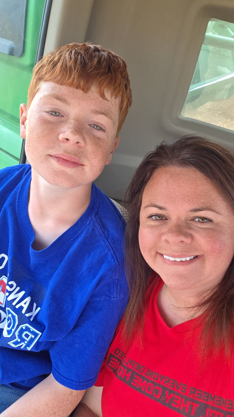 Kelsey Woelk sorghum farmer and son 2