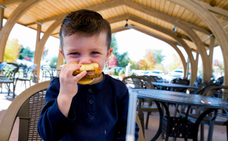 Is meat safe to eat - boy eating hamburger